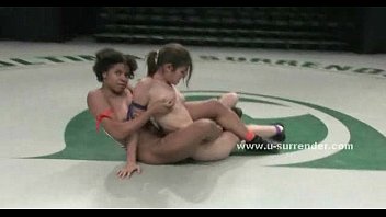 Chocolate lesbian beauty gets naked after wrestling a blonde and rides her face